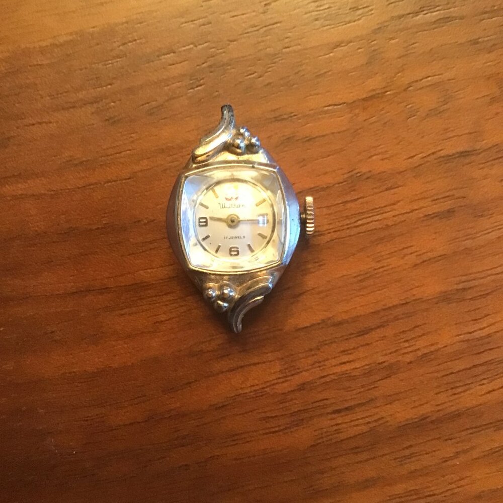 Vintage ladies' Waltham watch (face and backing)